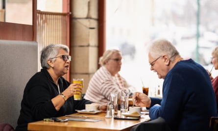 Lali and Jozsef sitting at a restaurant table