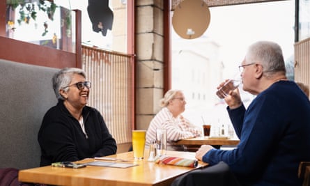 Lali and Jozsef sitting at a restaurant table