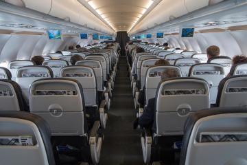 Mum reveals 'petty' revenge on reclined plane passenger but no-one is on her side