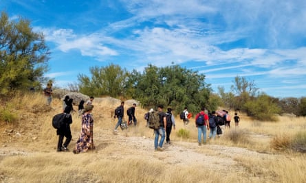 Afghan migrants wander through the desert landscape, in Sonora state, Mexico, in December 2022.