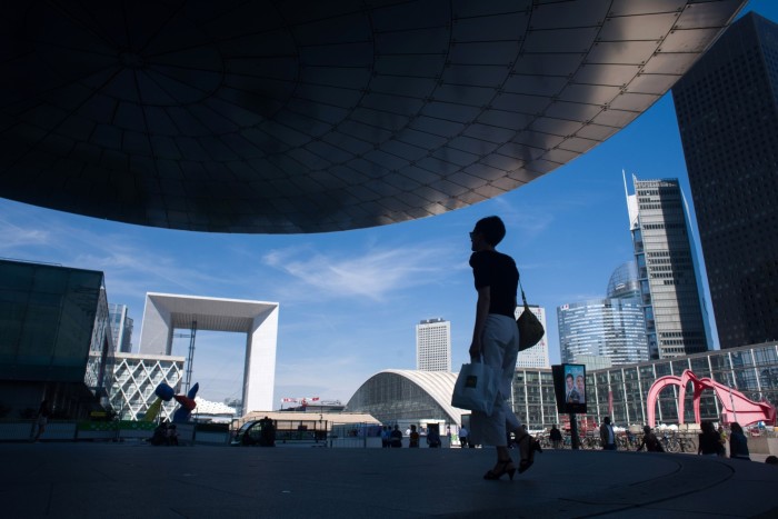 Office workers in La Defense financial district of Paris