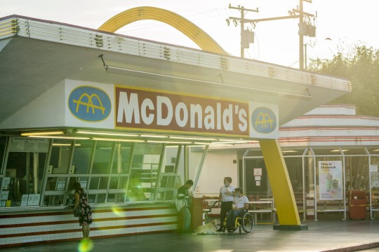 Customers order food at the oldest operating McDonald's Corp. restaurant on Monday, April 27, 2020. McDonald's is cutting capital expenditures and suspending buybacks as the coronavirus pandemic gnawed at sales. Photographer: Kyle Grillot/Bloomberg via Getty Images