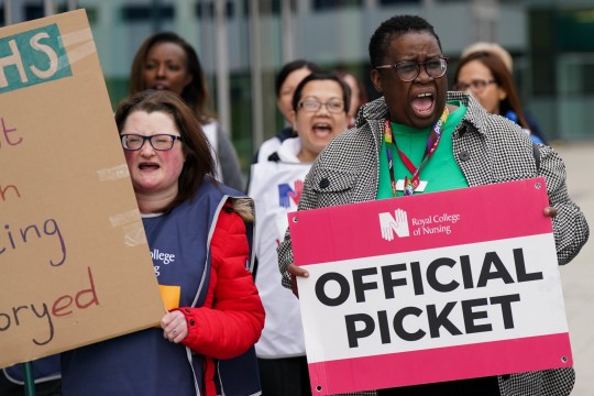 Members of the Royal College of Nursing union on the picket line outside Queen Elizabeth hospital in Birmingham as nurses take industrial action over pay. Picture date: Monday May 1, 2023. PA Photo. See PA story INDUSTRY Strikes. Photo credit should read: Jacob King/PA Wire
