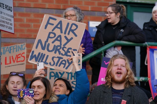 Members of the Royal College of Nursing (RCN) on the picket line outside Leeds General Infirmary, West Yorkshire, as nurses in England, Wales and Northern Ireland take industrial action over pay. Picture date: Tuesday December 20, 2022. See PA story INDUSTRY Strikes. Photo credit should read: Peter Byrne/PA Wire