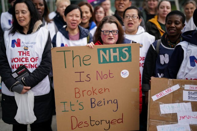 Members of the Royal College of Nursing union on the picket line outside Queen Elizabeth hospital in Birmingham as nurses take industrial action over pay. Picture date: Monday May 1, 2023. PA Photo. See PA story INDUSTRY Strikes. Photo credit should read: Jacob King/PA Wire