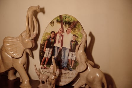 A family portrait with an inscription amid carvings of elephants