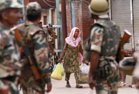 Soldiers patrol during a curfew imposed following deadly clashes between Hindus and Muslims in Muzaffarnagar district, Uttar Pradesh, September 2013.