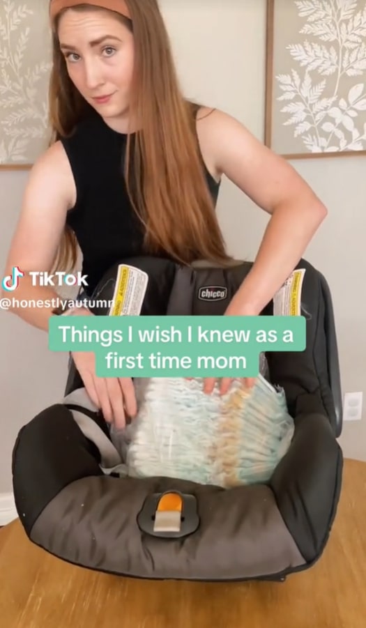 Autumn uses her child's car seat to pack extra items when travelling