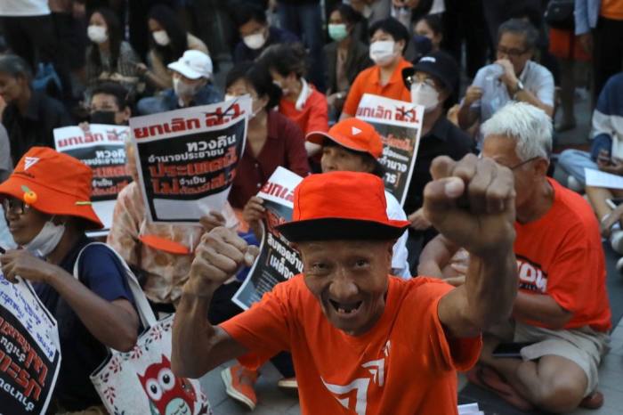 Supporters of Thailand’s Move Forward party and its prime ministerial candidate Pita Limjaroenrat gather outside the Bangkok Art and Culture Centre on Friday
