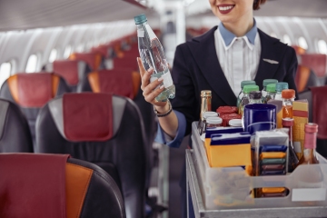 Planes could soon track how much booze you’re drinking on flights