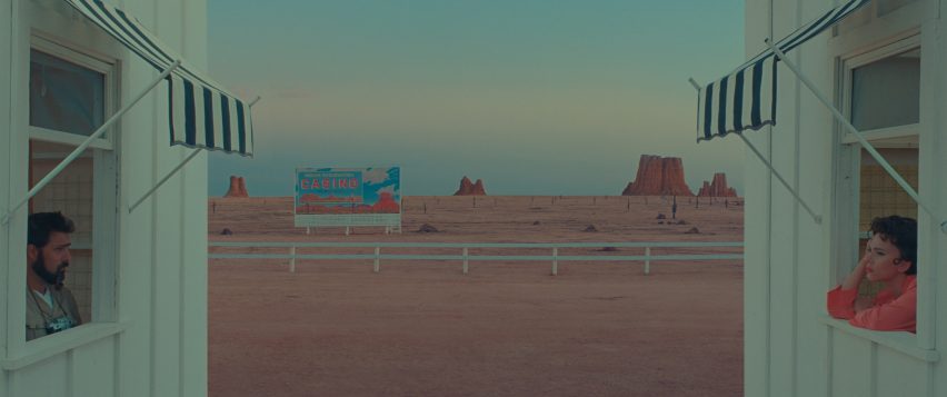 Two white shacks in a desert set on Asteroid City