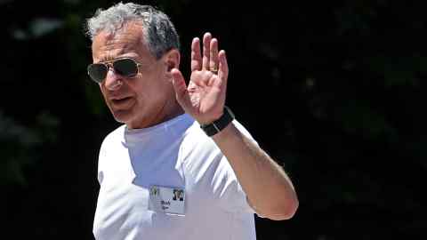 Disney chief Bob Iger waves as he arrives at the annual Allen & Co conference in Sun Valley, Idaho, on Tuesday