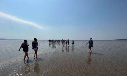 Walkers cross Morecambe Bay.