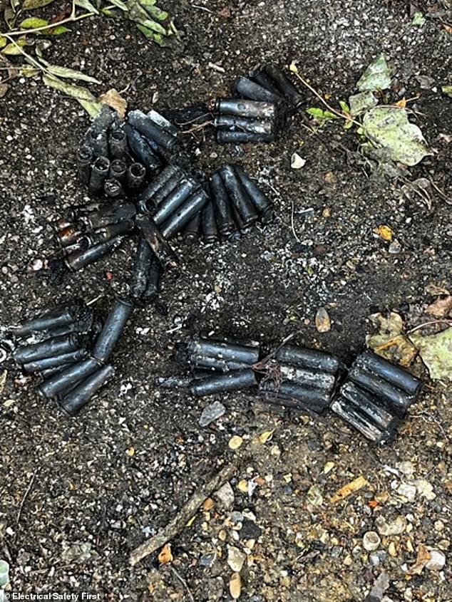 Scott Angus, 32 from London, revealed how he had a lucky escape after a neighbour's e-bike burst into flames in a communal hallway of a converted Victorian house last year. He saw burnt battery cells on the driveway outside (pictured) after fleeing the blaze