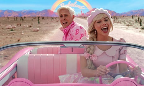 Ryan Gosling, left, and Margot Robbie in a scene from “Barbie.”