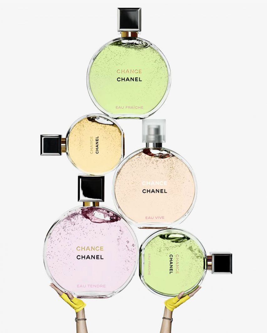A stack of pastel hued perfume bottles