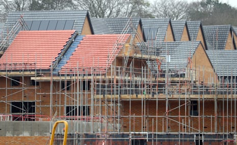 Houses under construction, as housebuilder Crest Nicholson said that the housing market has slowed considerably this summer, as it downgraded its profit forecast for the year.