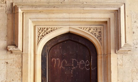 Ancient graffiti on ornate door