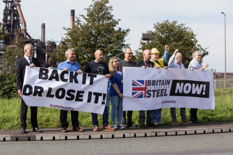 Protesters gather outside Tata Steel in Port TalbotProtesters hold signs outside Tata Steel, on the day of a government announcement about steel industry investments, in Port Talbot, Britain September 15, 2023. REUTERS/Joann Randles