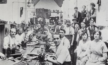 Workers at a clothing factory in Stepney owned by the Jewish Schneider family in 1917.