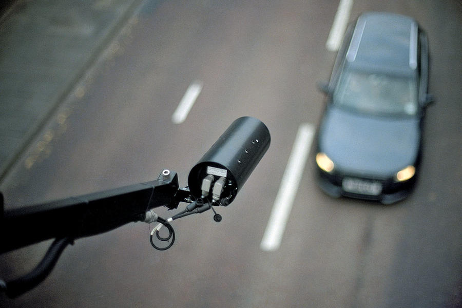 Surveillance camera on motorway gantry
