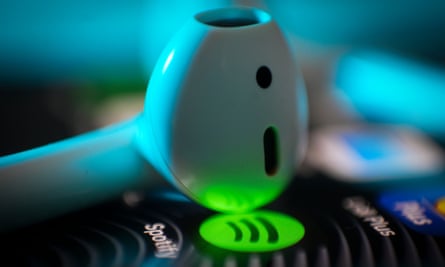 Spotify app and a earbud