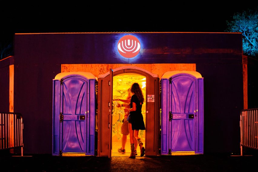 Portable toilet entrance to stage