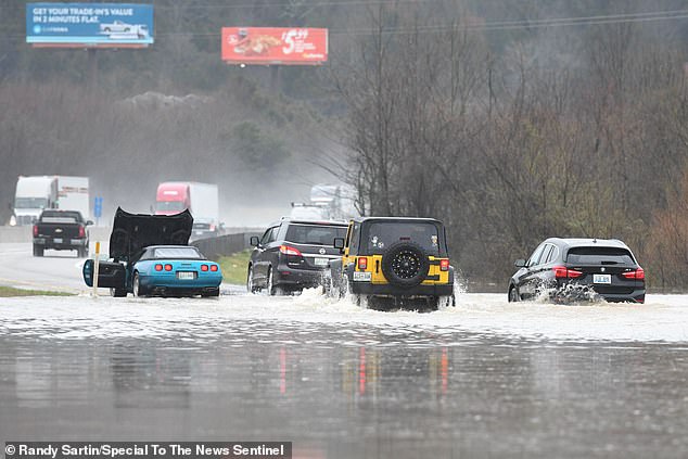 The team developed the tool by combining 184 publicly available data sets to rank more than 70,000 US census tracts. Pictured is flooding in Kentucky's Knox county