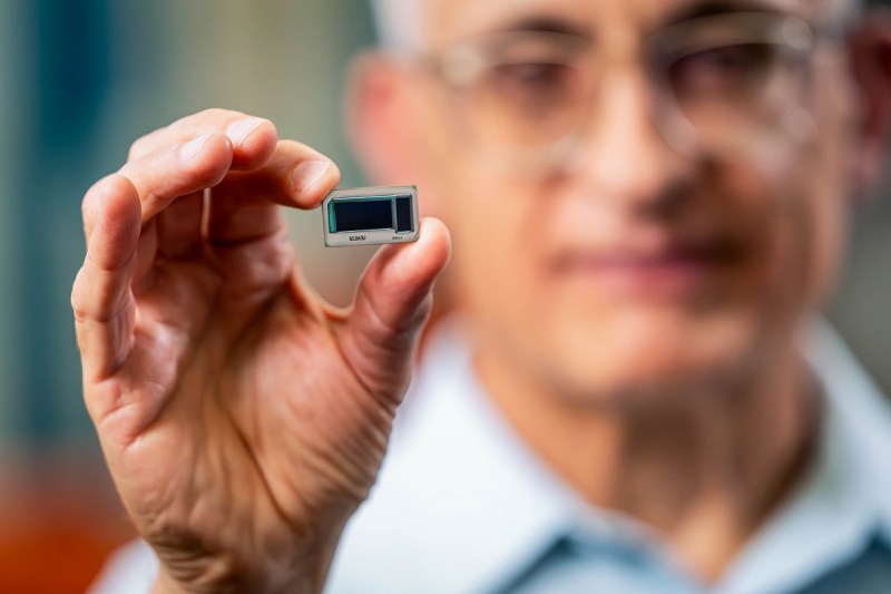 Hamid Azimi, corporate vice president and director of substrate technology development at Intel Corporation, holds an Intel assembled glass substrate test chip at Intel's Assembly and Test Technology Development factories in Chandler, Arizona, in July 2023. Intel’s advanced packaging technologies come to life at the company's Assembly and Test Technology Development factories.