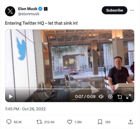 Elon Musk enters Twitter HQ carrying sink