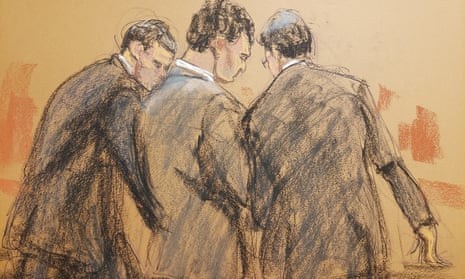 FTX founder Sam Bankman-Fried stands with his lawyers after the verdict is read in his fraud trial over the collapse of the bankrupt cryptocurrency exchange at federal court in New York City on Thursday, in this courtroom sketch.