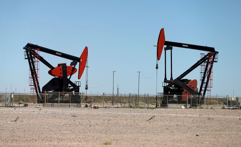 Oil dips on prospect of peak US production, despite strong demand signals