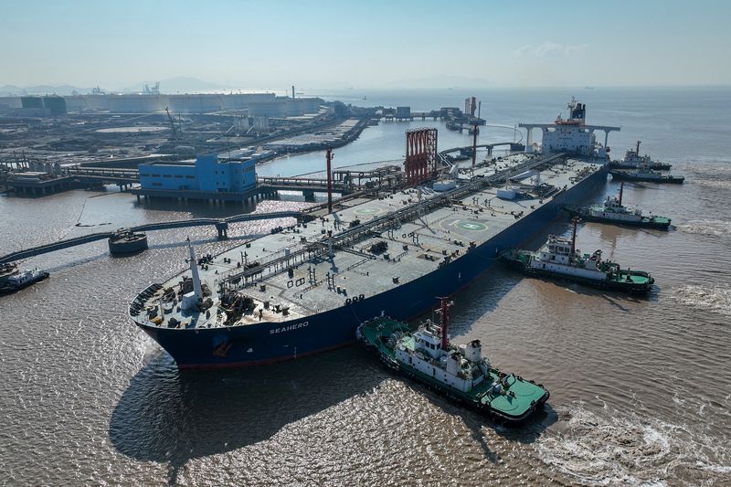 Oil settles lower but notches weekly gain ahead of OPEC+ decision