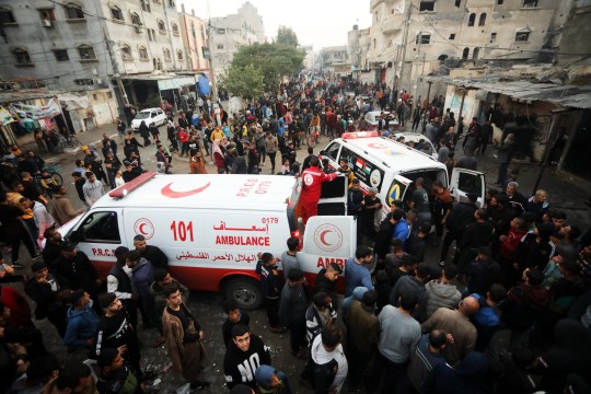Mandatory Credit: Photo by Ismael Mohamad/UPI/Shutterstock (14254597q) Palestinians react near ambulances following Israeli bombardment at Al-Shaboura refugee camp in Rafah in the southern Gaza Strip on Tuesday, December 12, 2023. At least 22 people have been reportedly killed, including seven children, in the bombing by Israel in Rafah on Tuesday. Global calls for a ceasefire have been ignored by Israel and the United States, as humanitarian aid operations have collapsed warning of starvation and disease amongst the Gaza population. Children and Other Civilians Killed in Israeli Bombing Attack on of Rafah in Southern Gaza - 12 Dec 2023