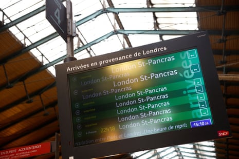 A sign board shows cancelled trains to London at the Eurostar terminal at Gare du Nord train station in Paris