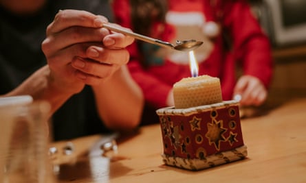 melting lead over a fancy candle