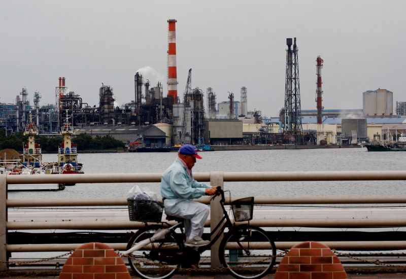 Japan manufacturers' mood jumps, second straight month of gains - Reuters Tankan