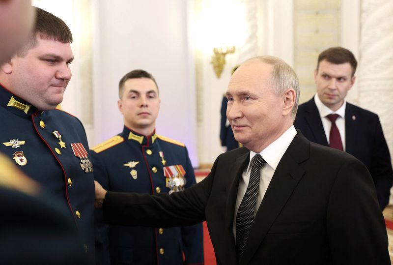 Russia's Putin tells soldiers: I will run for president again in 2024