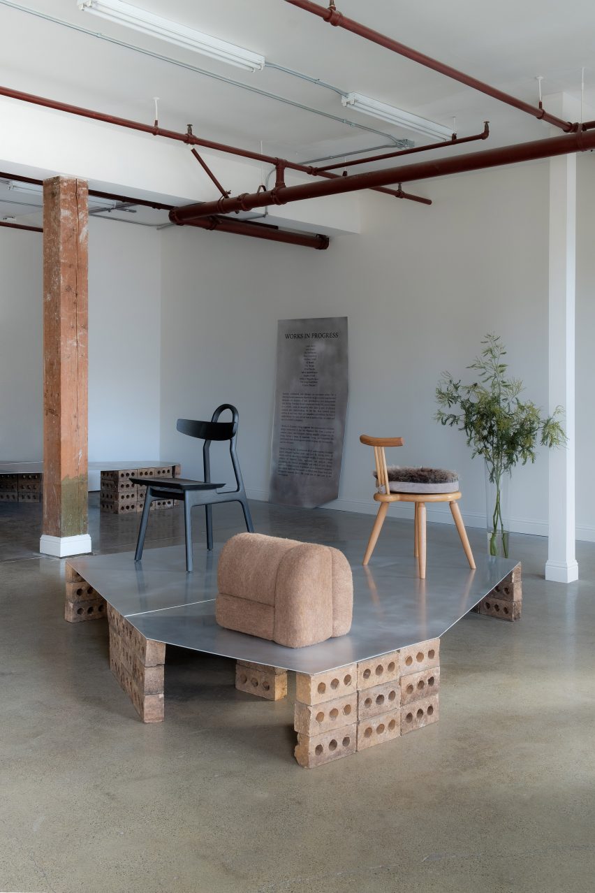 Two chairs and a fuzzy stool displayed on podiums