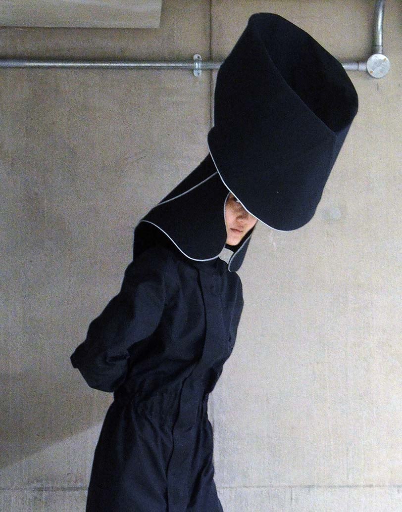 headwear evolved to function as a rainwater collection tool 5