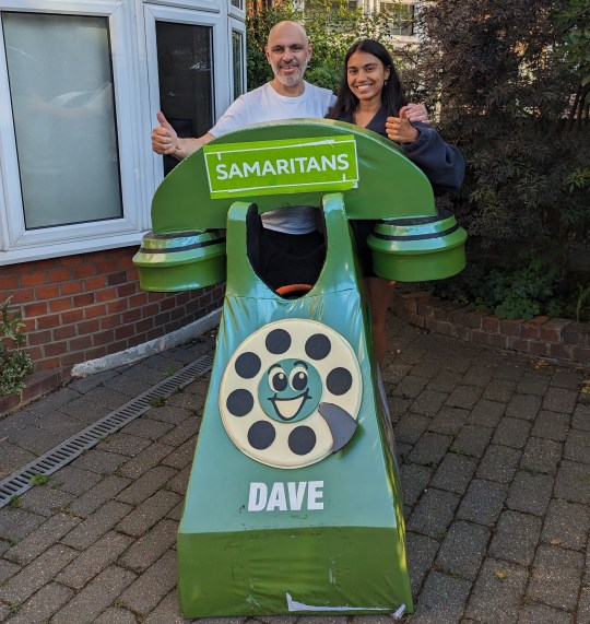 Dave with his telephone costume and his daughter Isabella who will be running the London Marathon with him this year