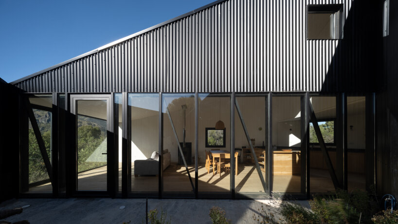 moarqs fits self-sufficient house in argentina forest with solar and water-harvesting systems