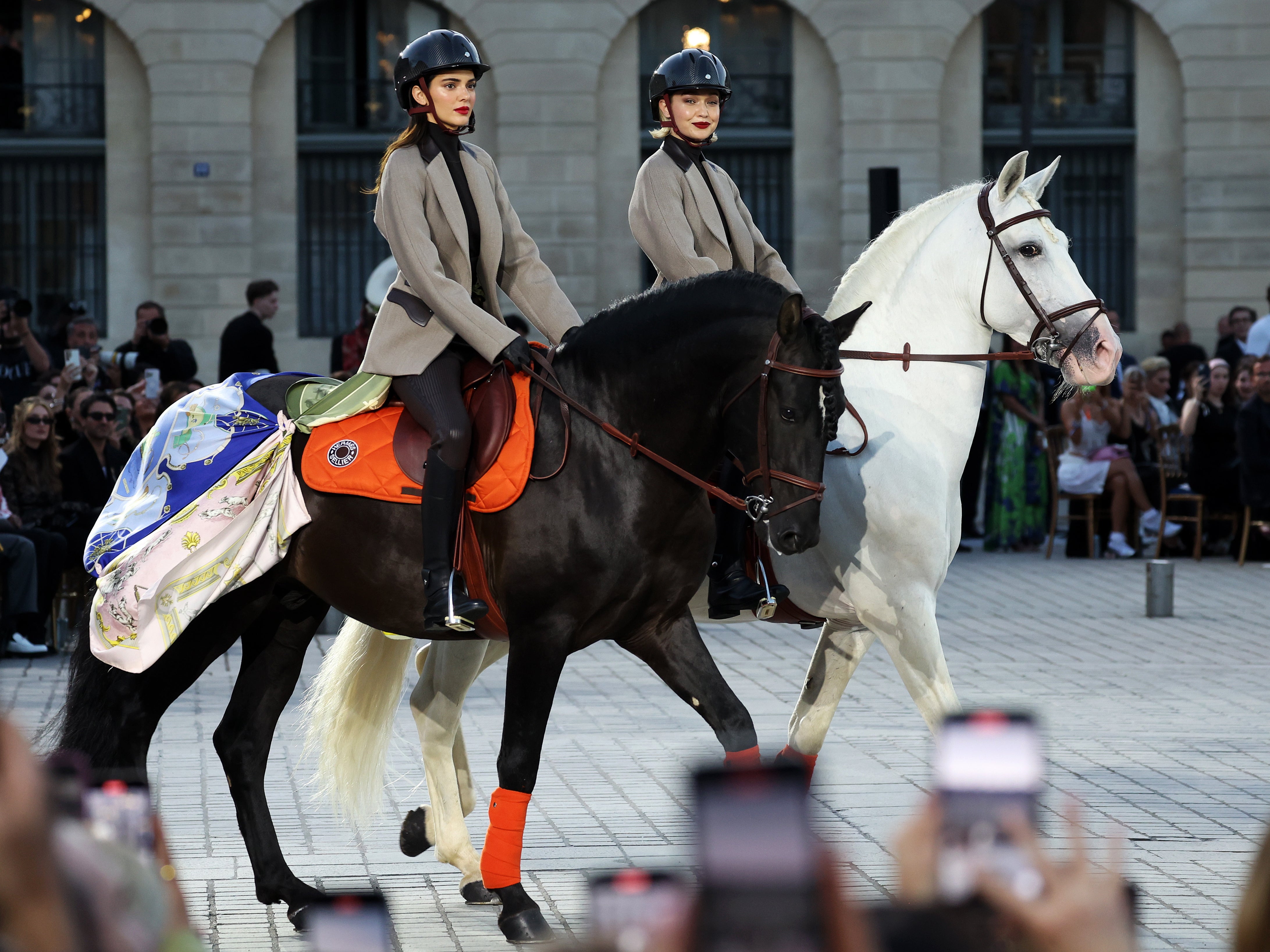 Kendall Jenner and Gigi Hadid arrived at the runway of the Vogue World: Paris show on horses on 23 June