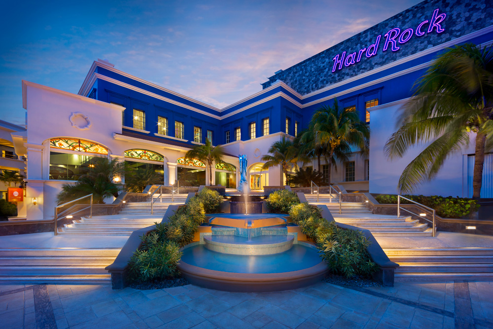 The swimming pool at the Hard Rock Riviera Maya Heaven is lined with sunloungers