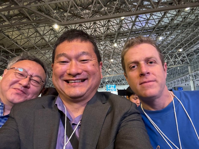 Shu Yoshida of Sony and Geoff Keighley of The Game Awards with Dean Takahashi at TGS. 