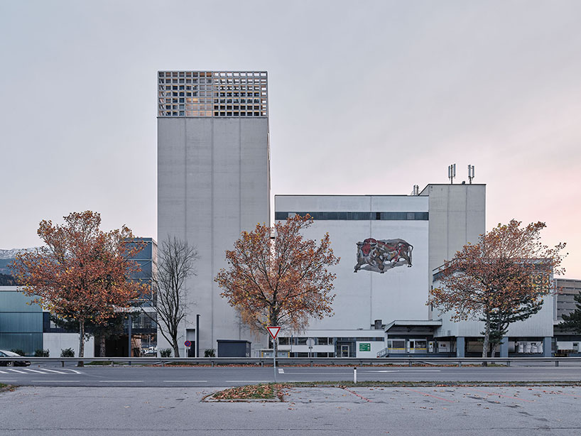 concrete crown by obsermoser + partner architekten transforms a 1978 grain silo into a storing-center for wood pellets