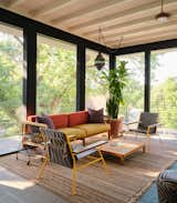 This newly built Austin residence cleverly reimagines the shotgun layout while paying tribute to its owner’s Louisiana roots. A floating steel stair in the central vestibule takes visitors to the second floor, where an oversize screened porch peers over the city’s downtown skyline.