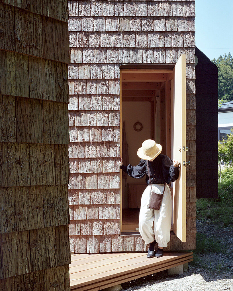 W architects tucks shingle-wrapped 'double house' into japanese forest