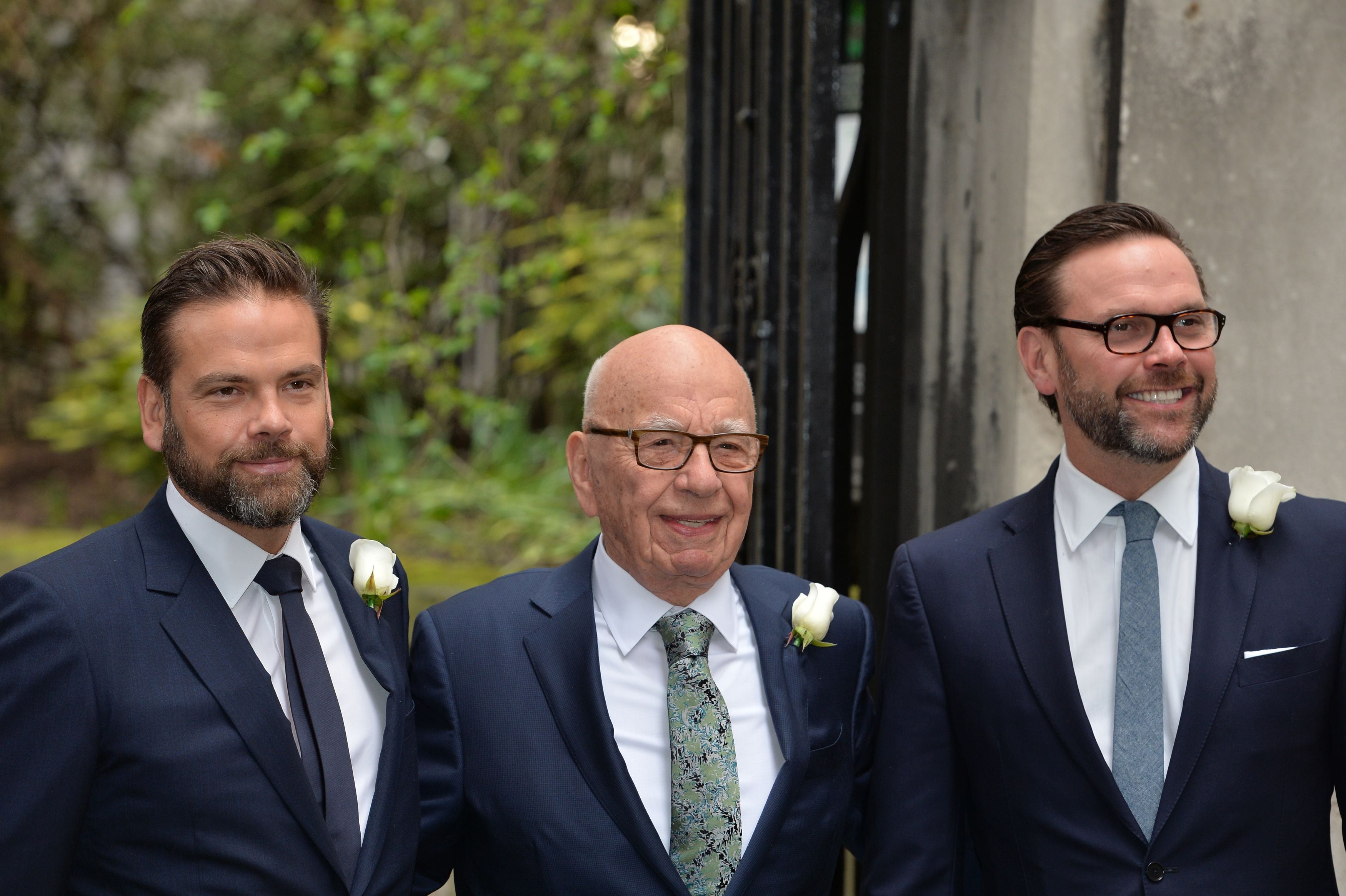 Rupert Murdoch accompanied by his sons James (right) and Lachlan (left) in 2016 (John Stillwell/PA)