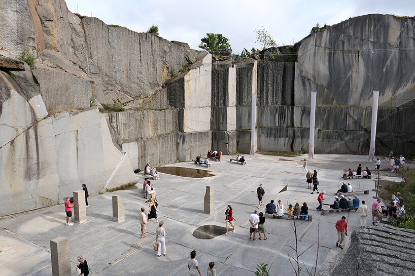 natural forces sculpt rammed earth columns in sustainable norwegian quarry installation